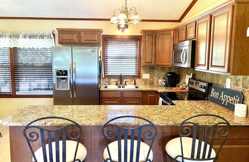 Mayhew House | Discover Lake Daze: Waterfront Retreat with Pool & Views