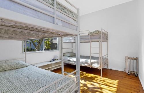 Buff Point House | Pet-Friendly Lake Edge Cottage with Oceanfront Views