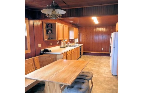 West Branch Cottage | Scenic Lake Front Cottage: Family-Friendly with Dock Access