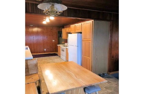 West Branch Cottage | Scenic Lake Front Cottage: Family-Friendly with Dock Access