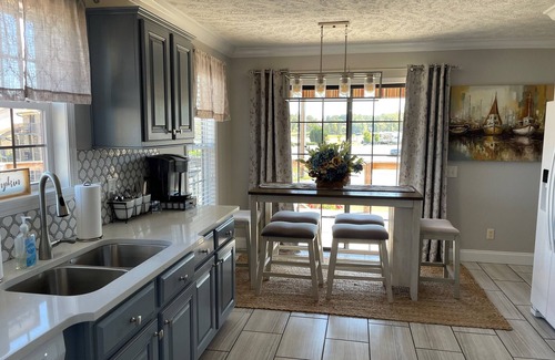 Dandridge House | Family-Friendly Lakefront Cabin with Spa & Ocean Views