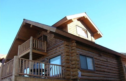 West Yellowstone Cabin | Serene Lake Front Log Cabin with Spa and Boat Slip