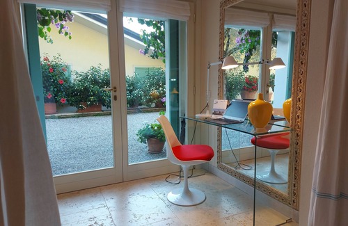 Frader Apartment | Elegant Lake Garda Studio with Pool and Ocean Views