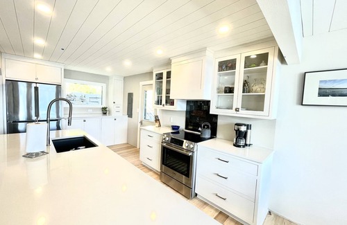 Plymouth House | Lakefront Retreat with Crystal Clear Waters and Ocean Views