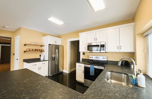 Logan Cabin | Serene Lake House Villa with Spa and Hot Tub Experience