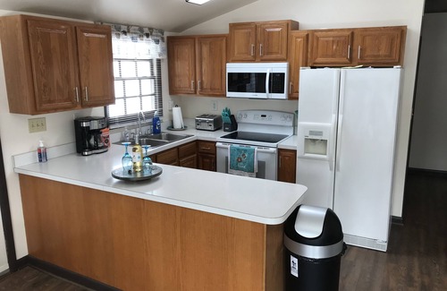 Hedgesville House | Relaxing Lake House with Pool and King Bed - Pets Welcome!