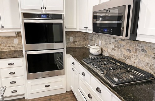 Malakoff House | Lake House with pool + hot tub on Golf Course with boat dock