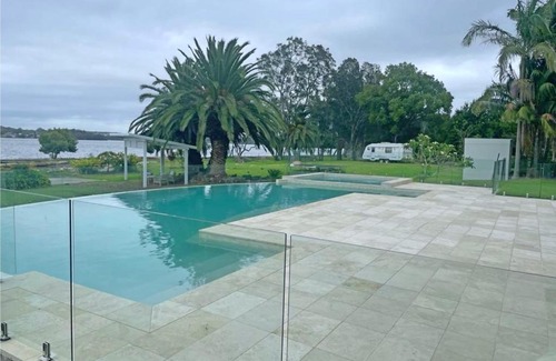 Dora Creek Villa | Discover Lake Palm Retreat: Family-Friendly with Pool Access