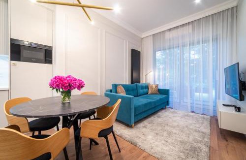 Mikolajki Apartment | Lake Park Apartment: Family-Friendly 4-Star Retreat