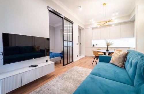 Mikolajki Apartment | Lake Park Apartment: Family-Friendly 4-Star Retreat