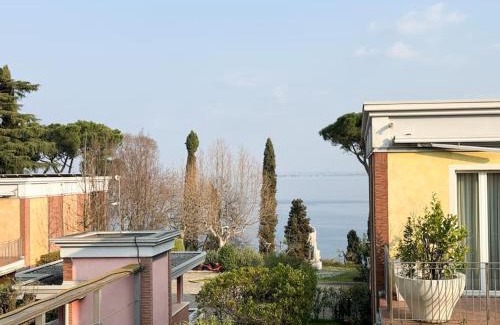 Padenghe sul Garda Apartment | Serene Lake View Apartment with Pool and Private Beach