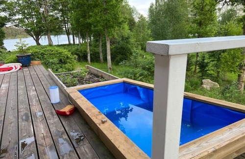 Vittsjo House | Idyllic Lake View Retreat with Pool and Spa Amenities