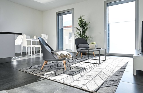 Melide Apartment | Lake View Suite Melide: Family-Friendly with Kitchen Access