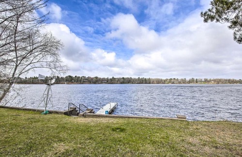 Rice Lake House | Lakefront 1930s Log Cabin with Private Beach & Dock Access