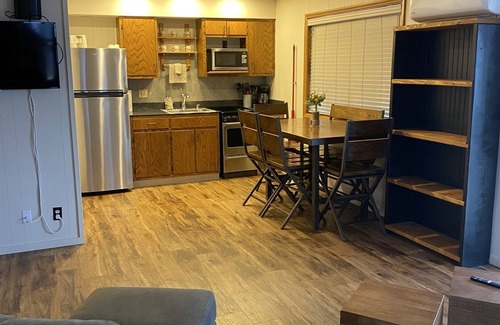 Kimberling City Cabin | Scenic Lakefront 2BR Duplex Cabin with Pool & Boat Dock
