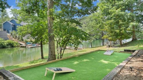 Moneta House | Lakefront 3BR with Dock, Fire Pit, Lawn Games, and Game Room