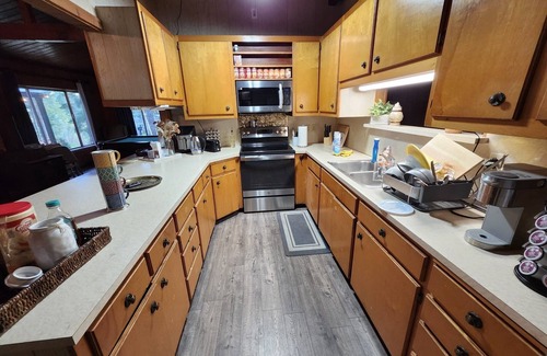 Douglas County Cabin | Lakefront Cabin Retreat with Breakfast and Pet-Friendly Perks