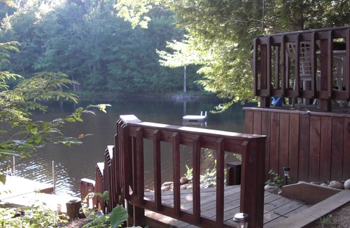 Croghan Cabin | Idyllic Lakefront Cabin Retreat with Pool & Ocean Views