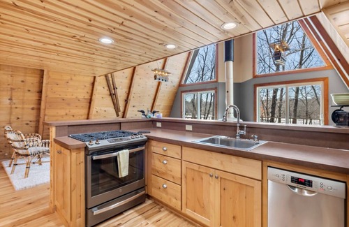 Comstock Cabin | Lakefront Cabin with Loft & Bar in Comstock WI - New Vacation Rental!