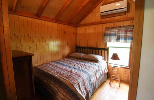 Mead House | Scenic Lakefront Cedar Cabin - Pet and Child Friendly Stay