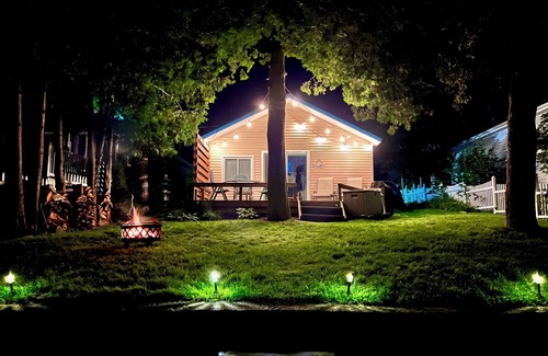Gladwin Cottage | Scenic Lakefront Cottage on Wiggins Lake with Pool & Spa