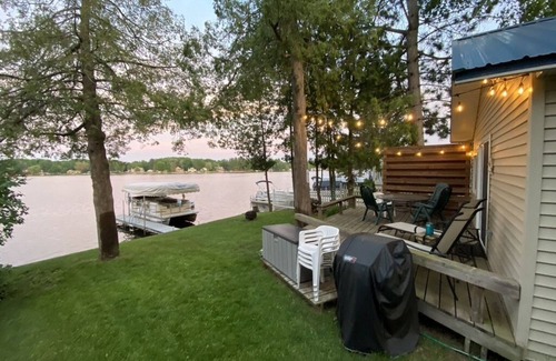 Gladwin Cottage | Scenic Lakefront Cottage on Wiggins Lake with Pool & Spa