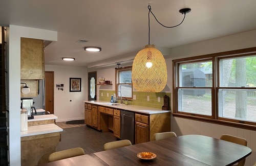 Newaygo Cottage | Lakefront Cottage with Private Beach & Top Amenities Await