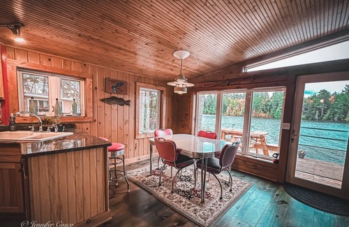 Gwinn Cottage | Cozy Cedar Cottage: Lakefront Retreat with Spa & Firepit