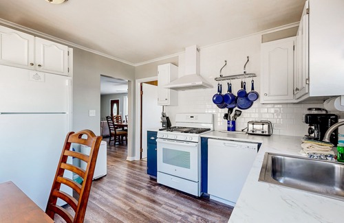 The Bays House | Scenic Lakefront Retreat with Private Beach and Boat Slip