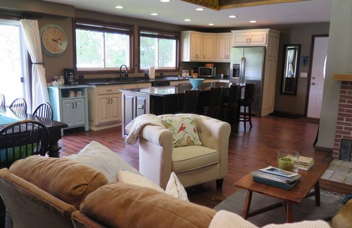 Lake George House | Inviting Lakefront Getaway in Michigan with Pool & Spa