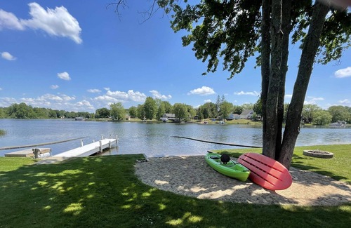 Gladwin House | Lakefront Home With Large Private Yard, Sandy Beach, Kayak and Rowboat Included.