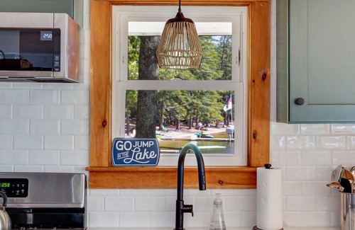 Shapleigh House | Idyllic Lakefront Retreat with Beach Access and Water Sports