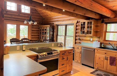 Solon Springs Cabin | Lake Front Log Cabin on ATV Trails with Pool and Views