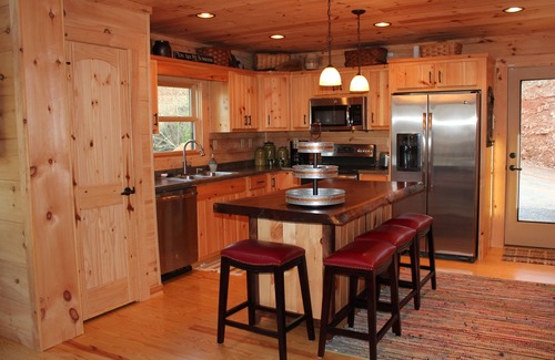 Valdese Cabin | Lakefront Log Cabin with Private Dock, Kayaks & Pool Access