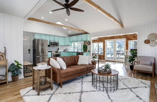Gladwin House | Lakefront Oasis with Private Beach & Pool - 10/10 Rating!