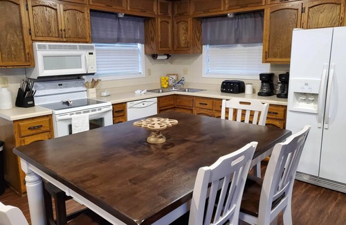 Roach House | LOZ FamilyFun Lakefront Home: Sleeps 26, Pool & Great Views