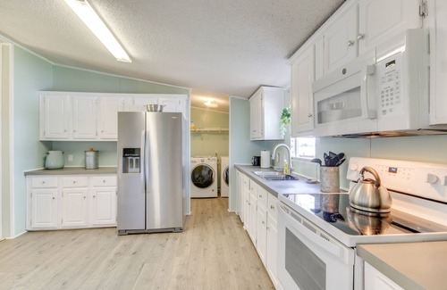 Prosperity House | Lakefront Prosperity Home with Private Boat Dock & Spa