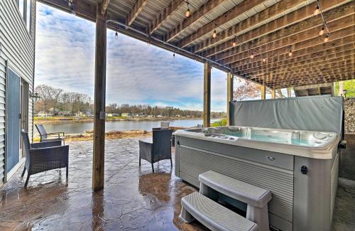 Gladwin House | Escape to a Scenic Lakefront Retreat with Relaxing Hot Tub