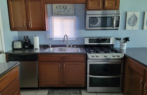 Decatur Cottage | Lakefront Getaway with Kayaks and Inviting Amenities