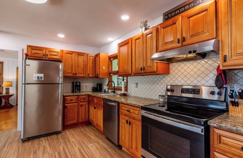 Whiteside House | Serene Lakefront Retreat: Hot Tub, Dock & Pet Friendly!