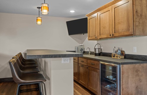 New Lisbon House | Inviting Lakehouse on Beach Lake with Hot Tub & Porch