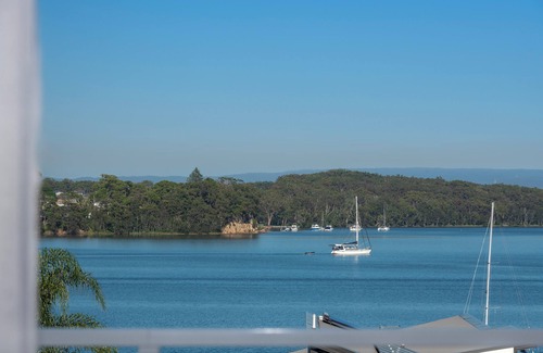 Nords Wharf House | Lakeside Bliss - Your Coastal Family Escape