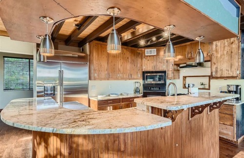 Jonestown House | Relaxing Lakeside Cabin with Patio and Treehouse Retreat