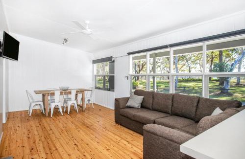 Cudmirrah Resort | Relaxing Lakeside Cabins with Ocean View & Pool Access