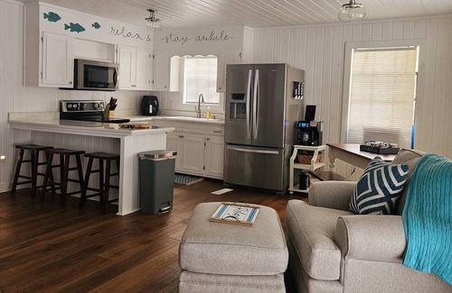 Andalusia Ski Chalet | Scenic Lakeside Chalet with Spa & Ocean Views on Gantt Lake