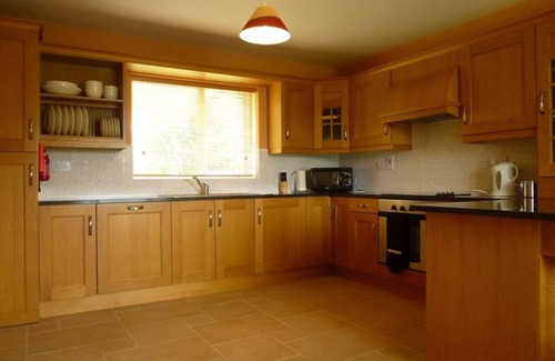Belturbet House | Inviting Lakeside Bungalow with Spa and Ocean Views