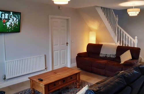 Belturbet House | Inviting Lakeside Bungalow with Spa and Ocean Views