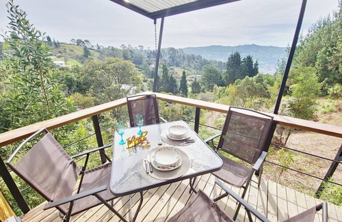 Guarne House | Lakeside Glamping with View, Fire Pit and Hammock
