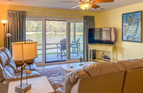 Sea Trail Apartment | Tranquil Lakeside Haven with Pool & Family-Friendly Fun