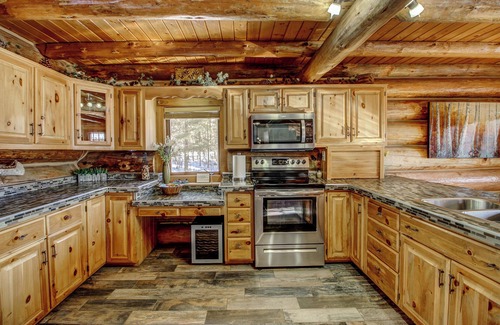 Nevis House | Serene Log Home Getaway with Lake View and Water Toys